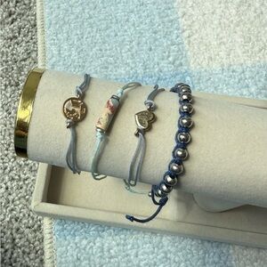 Set of Four Blue String Charm Bracelets